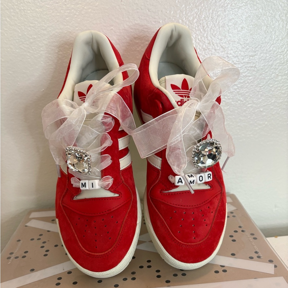 Adidas Red and White rivalry Sneakers with shoe charms